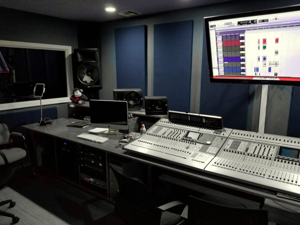 Studio A control room, acoustic treatment, and mixing console